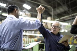 Profit Growth Consulting - a business owner celebrates a more efficient process