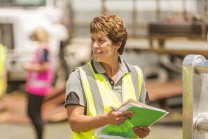 Business Turnarounds Brisbane, Sydney and Melbourne - a woman who runs a trucking company looks to her right